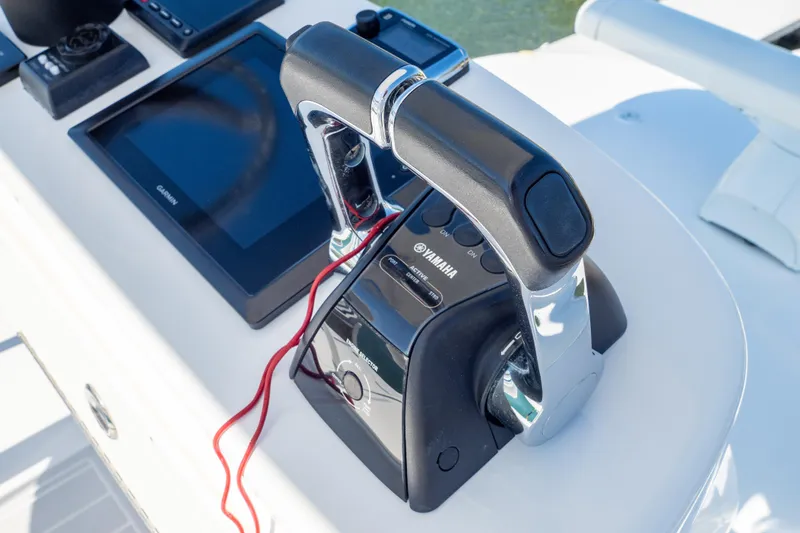  Yacht Photos Pics Throttle controls on a 2015 Intrepid 400 Center Console boat dashboard.