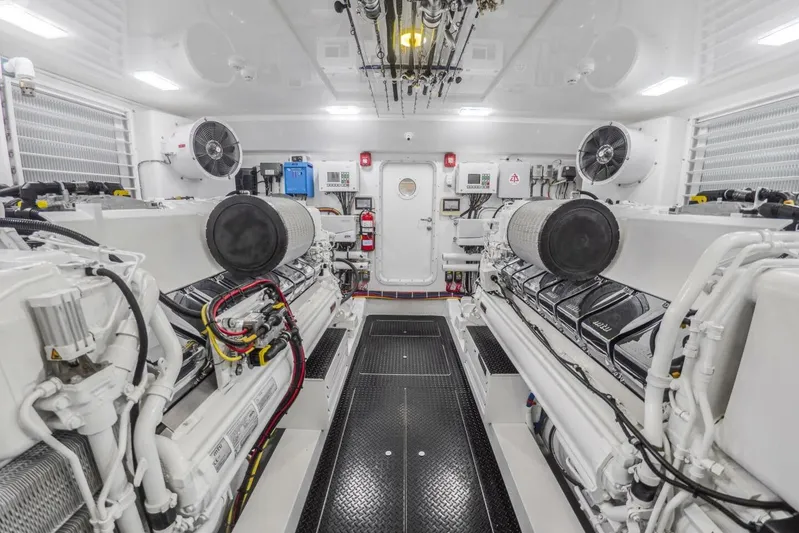 Marlin Magic Yacht Photos Pics Engine room of 2021 Viking 92 Skybridge yacht, featuring advanced machinery and equipment.