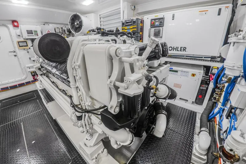 Marlin Magic Yacht Photos Pics Engine room of 2021 Viking 92 Skybridge yacht, featuring advanced machinery and equipment.