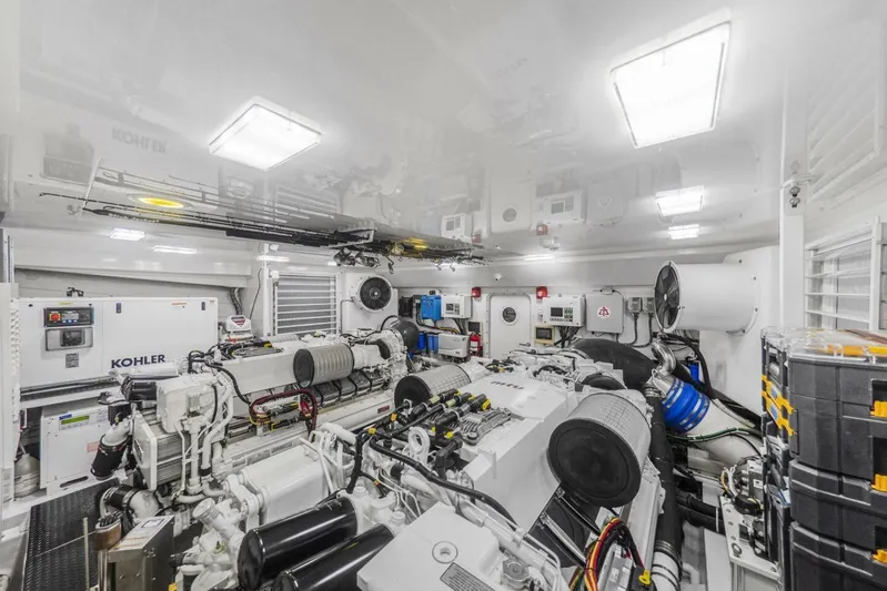 Marlin Magic Yacht Photos Pics Engine room of 2021 Viking 92 Skybridge yacht, featuring advanced machinery and equipment.