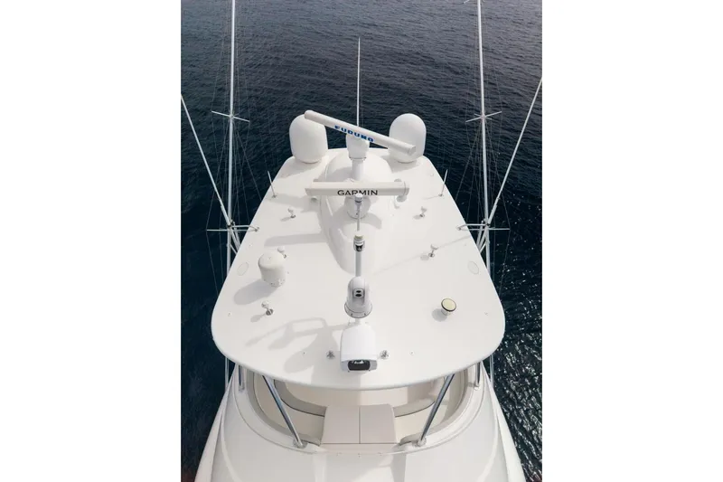 Marlin Magic Yacht Photos Pics Top view of 2021 Viking 92 Skybridge yacht with navigation equipment.