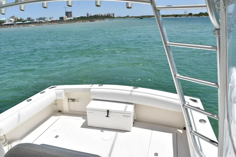 Miss Print Yacht Photos Pics 2006 Carolina Classic 32 boat deck with ocean view and city skyline in the background.