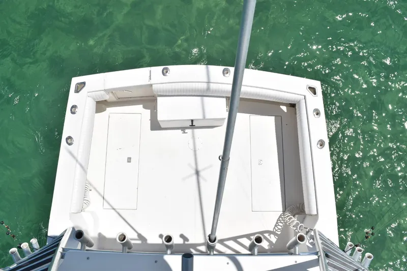 Miss Print Yacht Photos Pics Overhead view of 2006 Carolina Classic 32 boat deck on turquoise water.