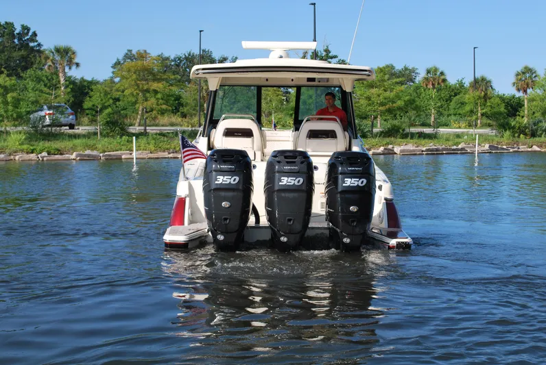  Yacht Photos Pics 2023 Chris-Craft Calypso 35 boat with triple 350 engines on water.