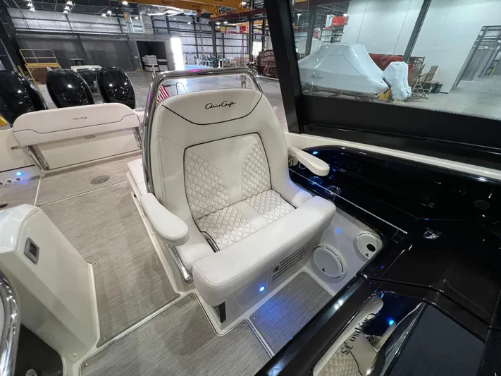  Yacht Photos Pics Luxurious interior of 2023 Chris-Craft Calypso 35 boat with plush seating and modern design.