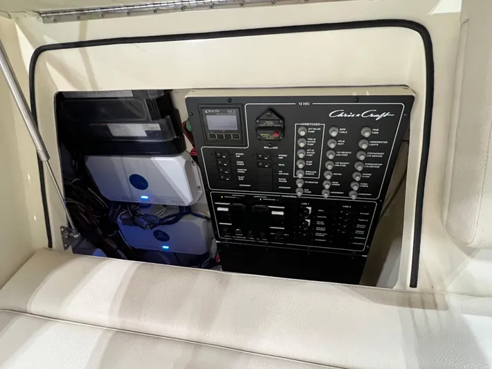  Yacht Photos Pics Electrical panel of 2023 Chris-Craft Calypso 35 boat, featuring control switches and wiring.