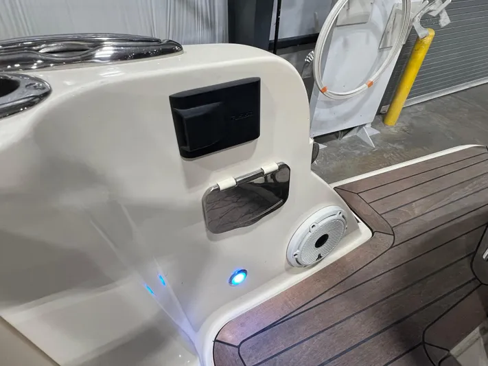  Yacht Photos Pics 2023 Chris-Craft Calypso 35 boat interior with speaker and deck details.