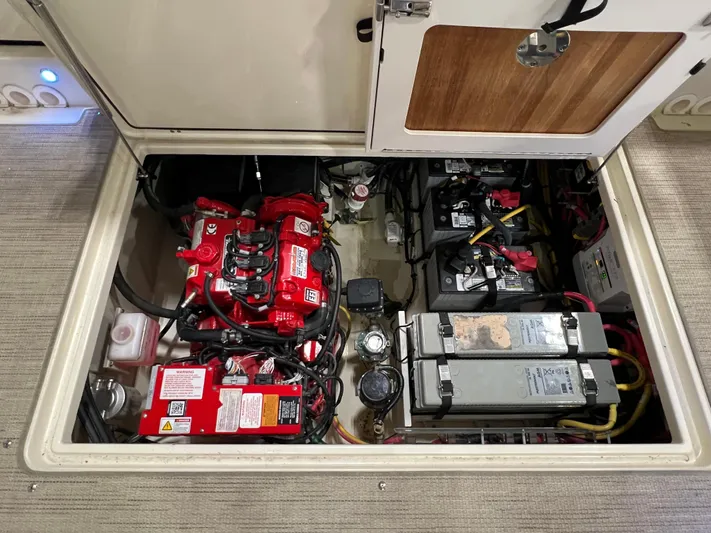  Yacht Photos Pics 2023 Chris-Craft Calypso 35 engine compartment with batteries and wiring.