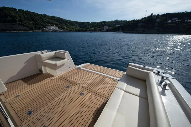 Pastiche Yacht Photos Pics 2019 Greenline Hybrid boat deck with scenic water view and comfortable seating.