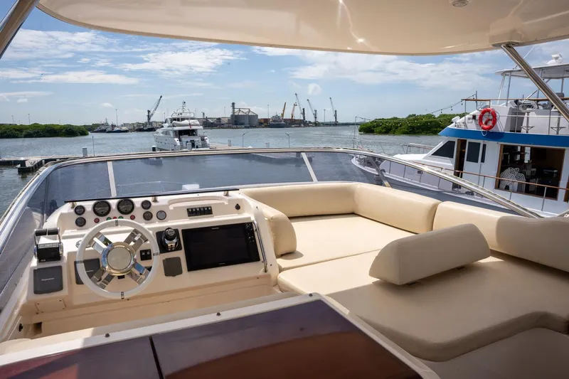 The Real D Yacht Photos Pics Azimut 60 Flybridge 2013 yacht helm with waterfront view and luxurious seating.