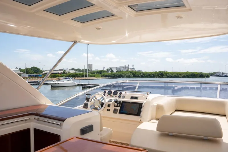 The Real D Yacht Photos Pics Luxurious 2013 Azimut 60 Flybridge yacht interior with scenic waterfront view.