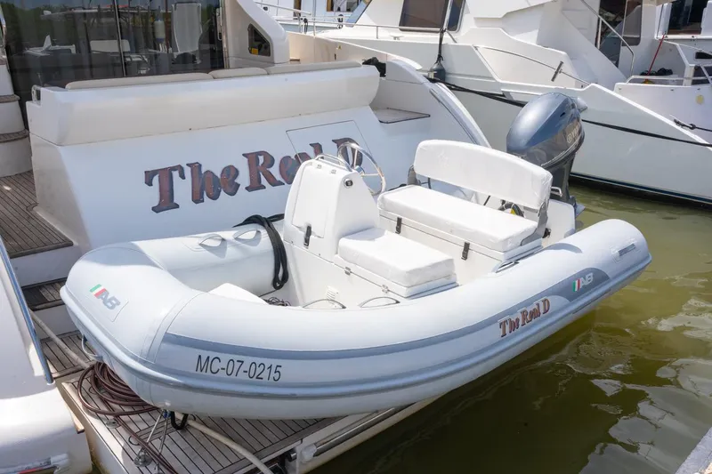 The Real D Yacht Photos Pics Azimut 60 Flybridge 2013 yacht with tender boat docked at marina.