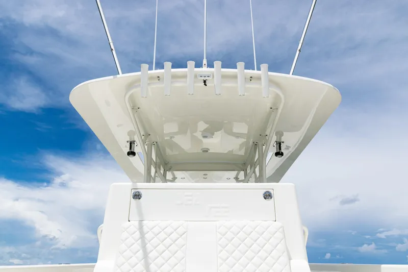  Yacht Photos Pics 2017 SeaVee 370z boat with white seating and blue sky background.