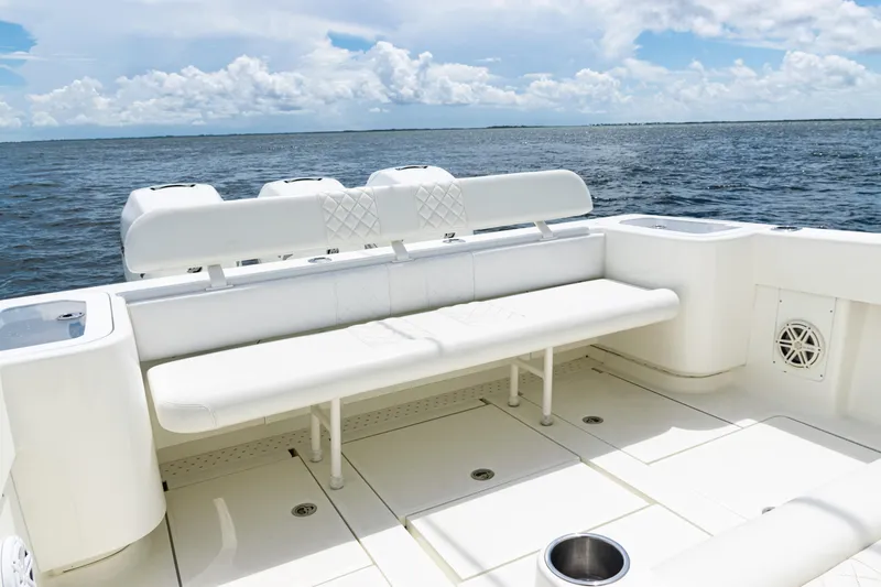  Yacht Photos Pics 2017 SeaVee 370z boat interior with white seating, ocean view, and clear sky.