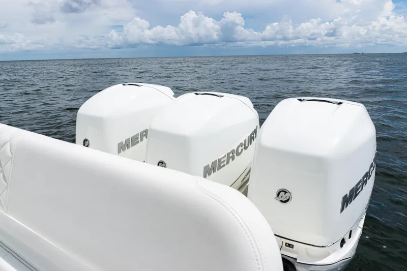  Yacht Photos Pics 2017 SeaVee 370z boat with triple Mercury outboard engines on open water.