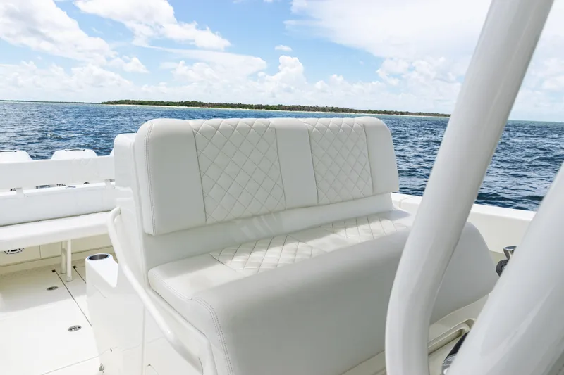  Yacht Photos Pics 2017 SeaVee 370z boat interior with white seating, ocean view.