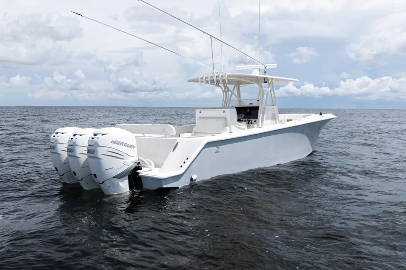  Yacht Photos Pics 2017 SeaVee 370z boat with triple Mercury engines on open water.