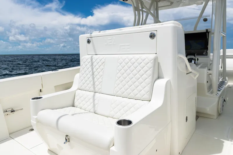  Yacht Photos Pics Luxurious seating on 2017 SeaVee 370z boat with ocean backdrop.