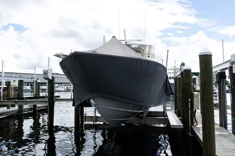  Yacht Photos Pics 2017 SeaVee 370z boat covered at dock, ready for storage.