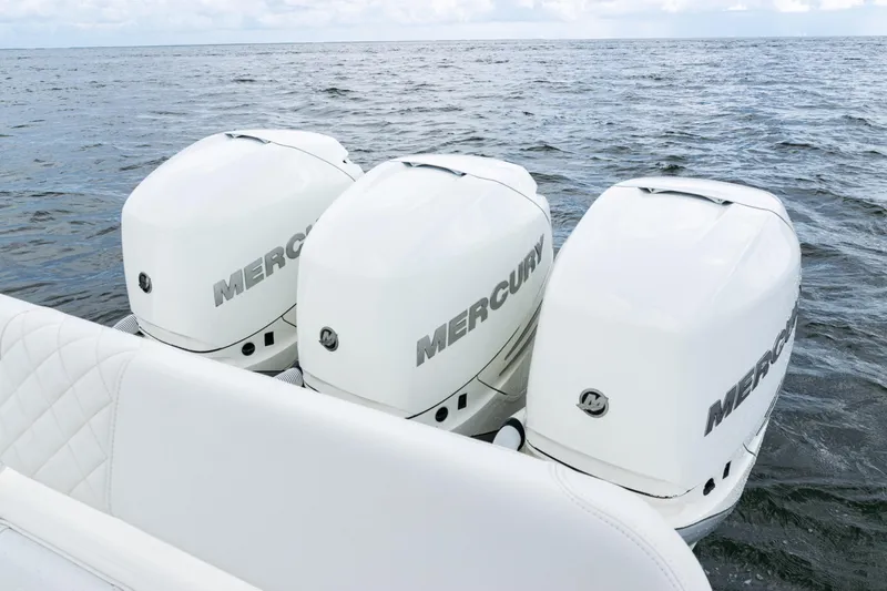  Yacht Photos Pics Triple Mercury outboard engines on a 2017 SeaVee 370z boat in open water.