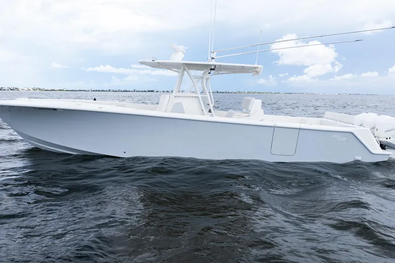  Yacht Photos Pics 2017 SeaVee 370z boat on open water under a cloudy sky.