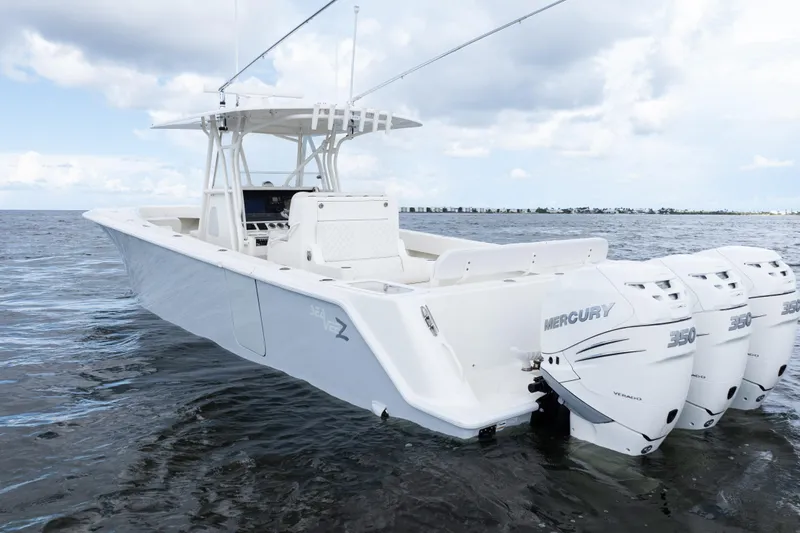  Yacht Photos Pics 2017 SeaVee 370z boat with triple Mercury 350 engines on open water.