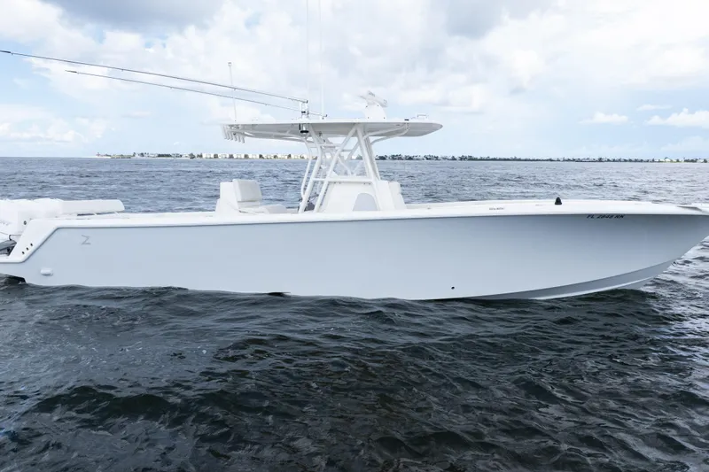  Yacht Photos Pics 2017 SeaVee 370z boat on open water under cloudy sky.