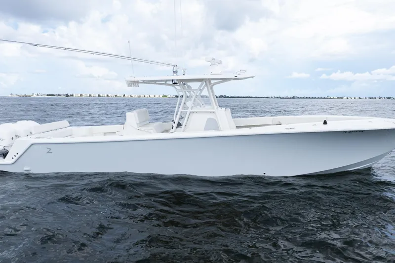  Yacht Photos Pics 2017 SeaVee 370z boat on open water under cloudy sky.