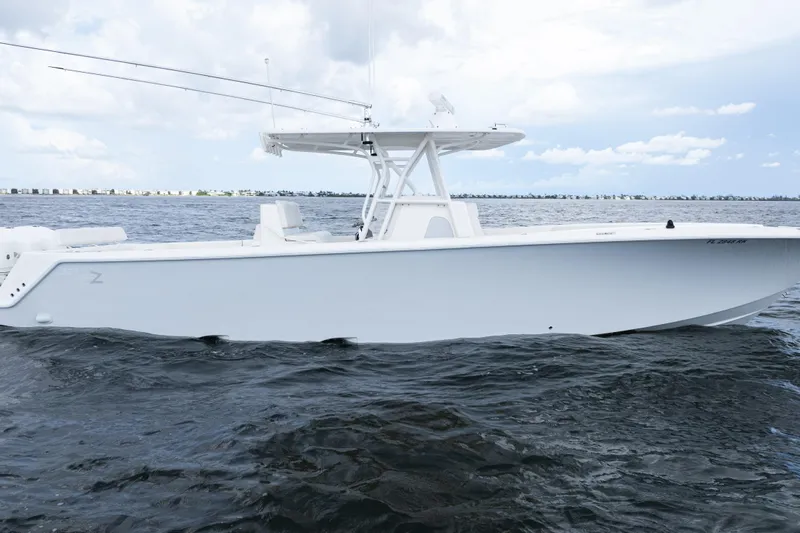  Yacht Photos Pics 2017 SeaVee 370z boat on open water under cloudy sky.