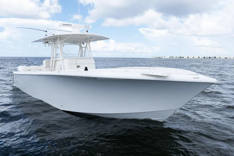  Yacht Photos Pics 2017 SeaVee 370z boat on open water under a partly cloudy sky.