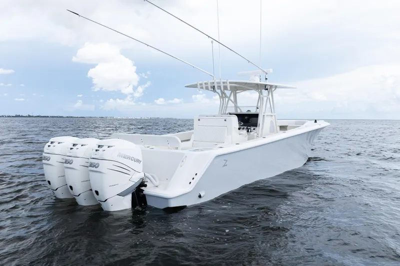  Yacht Photos Pics 2017 SeaVee 370z boat with triple Mercury engines on open water.