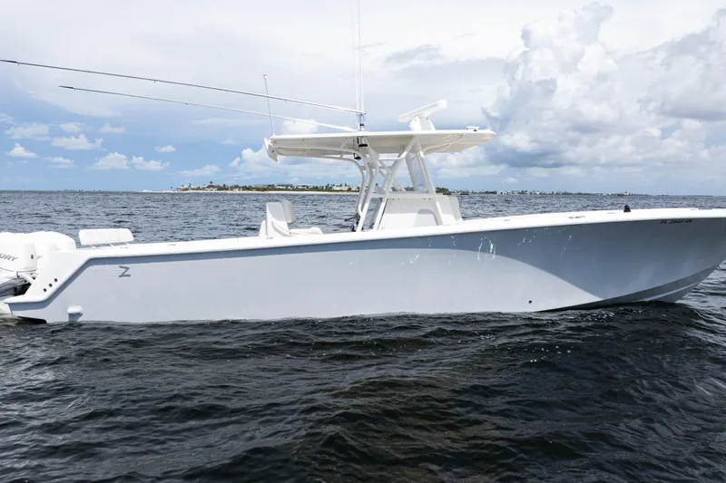  Yacht Photos Pics 2017 SeaVee 370z boat on open water under cloudy sky.