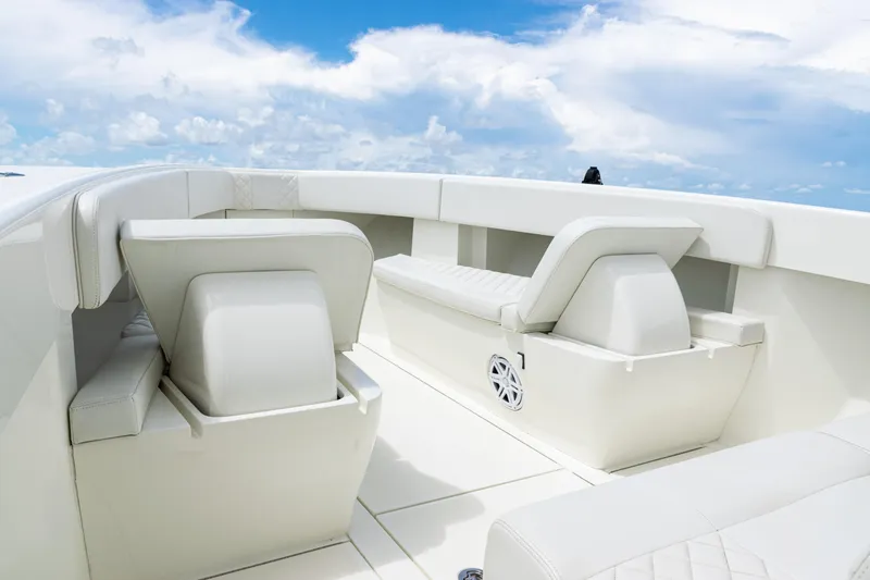 Yacht Photos Pics 2017 SeaVee 370z boat interior with white seating and clear blue sky.