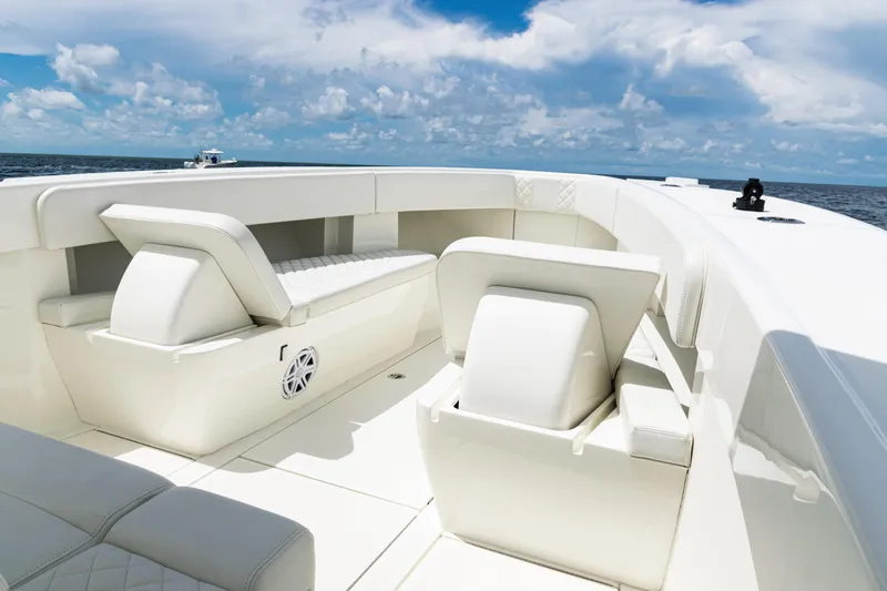 Yacht Photos Pics 2017 SeaVee 370z boat interior with white seating, ocean view, and blue sky.