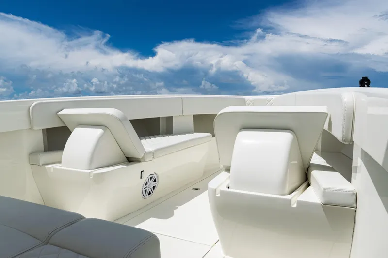  Yacht Photos Pics 2017 SeaVee 370z boat interior with white seating under a clear blue sky.