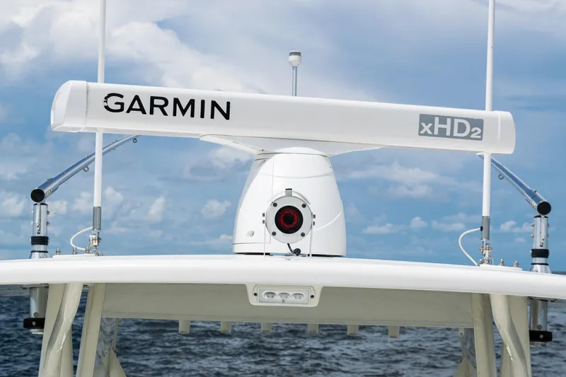  Yacht Photos Pics Garmin xHD2 radar on 2017 SeaVee 370z boat against a cloudy sky.