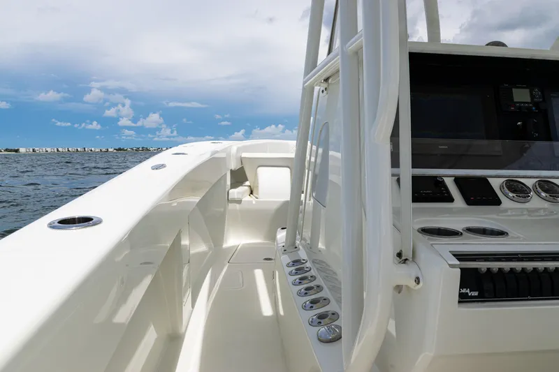  Yacht Photos Pics 2017 SeaVee 370z boat interior with control panel, ocean view, and clear sky.