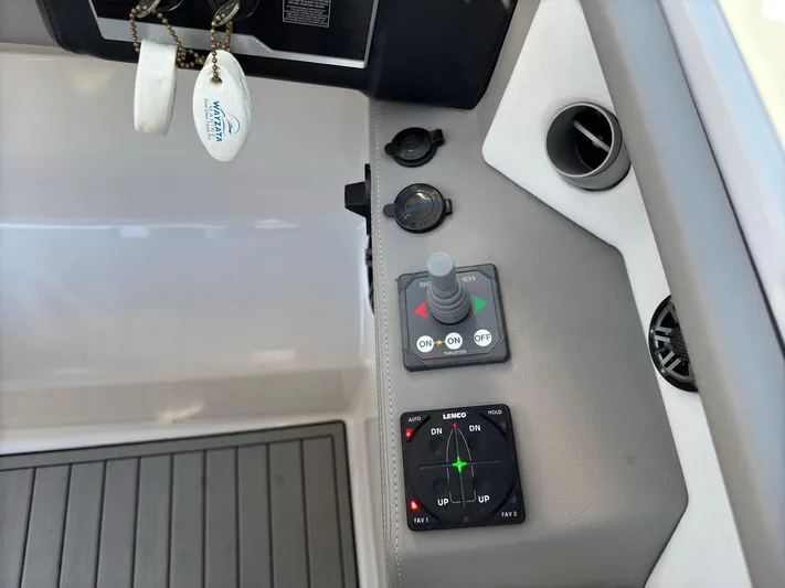 The Good Life Yacht Photos Pics Control panel of a 2019 Four Winns H350 boat with joystick and navigation controls.
