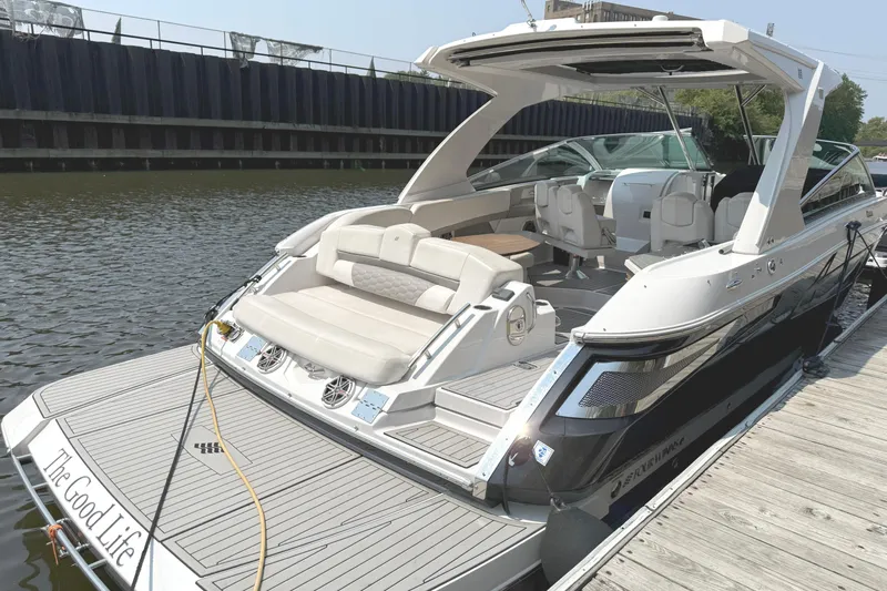 The Good Life Yacht Photos Pics 2019 Four Winns H350 luxury boat docked, featuring spacious seating and sleek design.