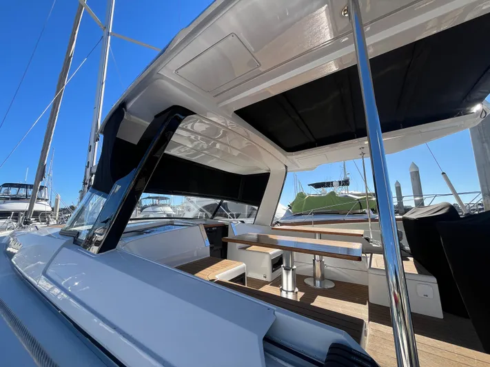 Hans Off Yacht Photos Pics 2023 Hanse 460 yacht with sleek deck design and modern seating area.