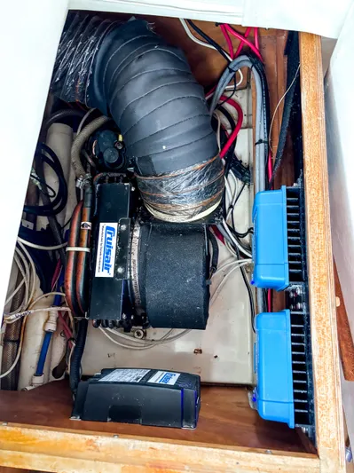  Yacht Photos Pics Engine compartment of a 2008 Leopard 46 yacht, featuring wiring and ventilation components.