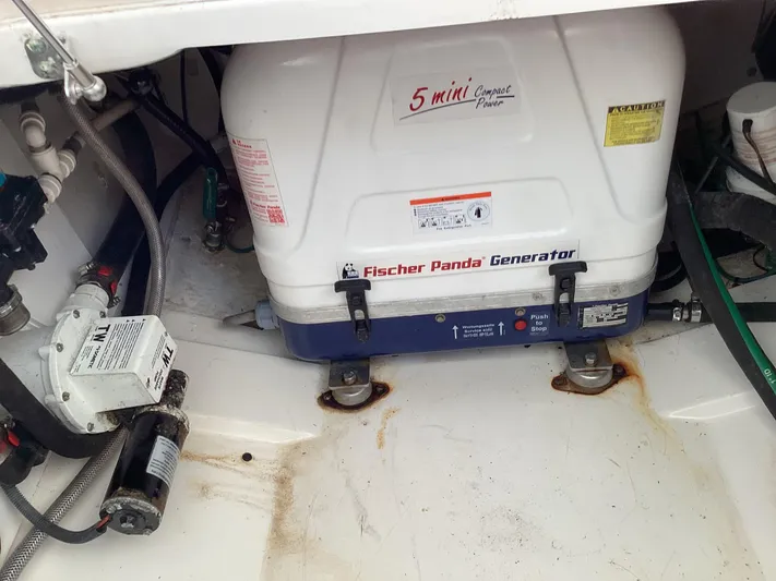  Yacht Photos Pics Fischer Panda generator in 2017 Pursuit DC 325 Dual Console boat compartment.