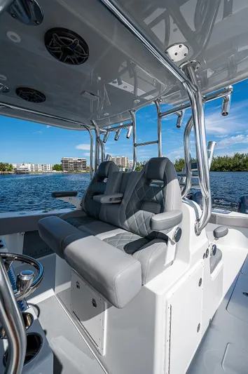 No Woke Zone Yacht Photos Pics 2019 Freeman 37 boat interior with luxurious seating and modern design on a sunny day.