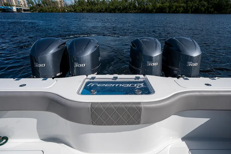 No Woke Zone Yacht Photos Pics 2019 Freeman 37 boat with four 300 horsepower engines on water.
