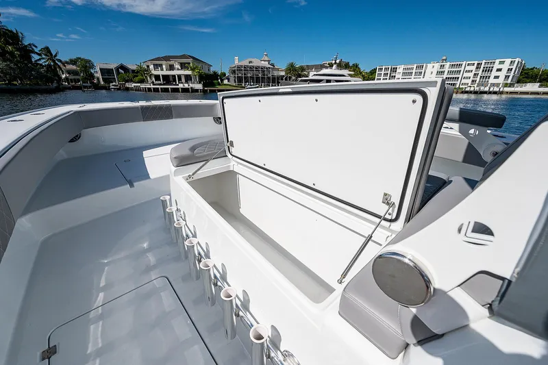 No Woke Zone Yacht Photos Pics 2019 Freeman 37 boat with open storage compartment on deck.
