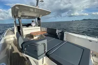2022 Nimbus T11 boat with spacious deck, luxury seating, and ocean view.