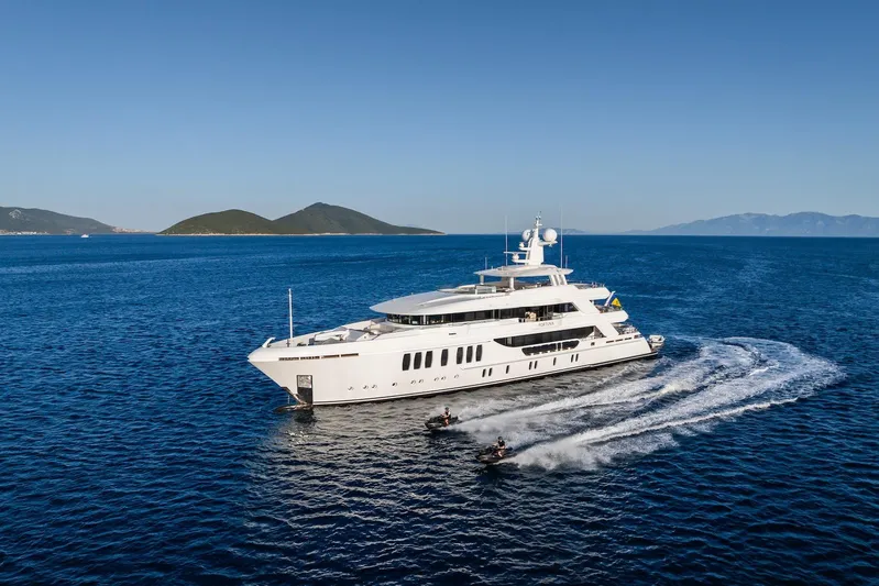 Fortuna Yacht Photos Pics Luxurious 2022 CMB Yachts CMB 47 cruising on serene blue waters.
