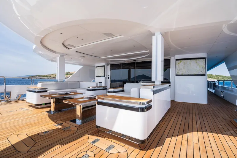 Fortuna Yacht Photos Pics Luxurious 2022 CMB Yachts CMB 47 deck with modern seating and ocean view.