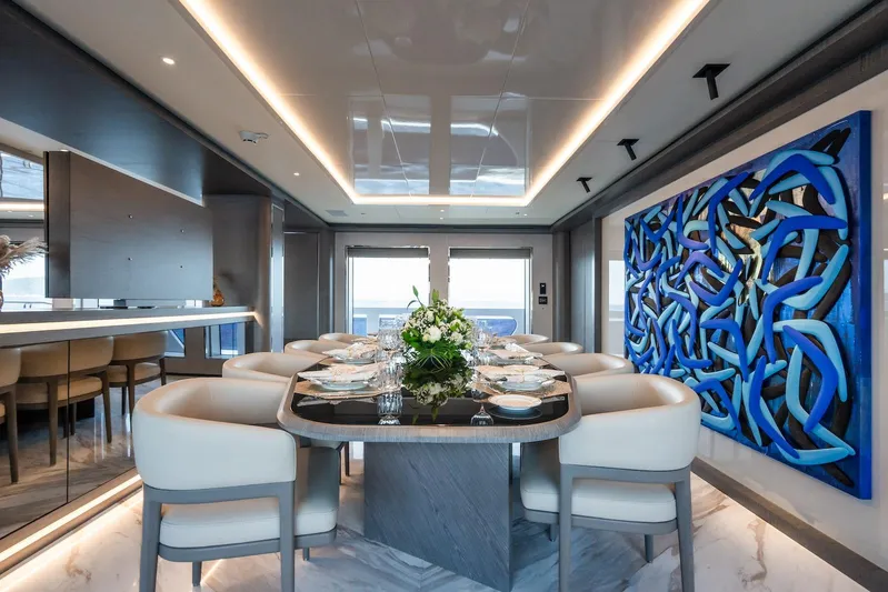 Fortuna Yacht Photos Pics Luxurious dining area on 2022 CMB Yachts CMB 47, featuring modern decor and elegant seating.