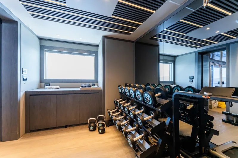 Fortuna Yacht Photos Pics Luxurious gym on 2022 CMB Yachts CMB 47, featuring modern equipment and sleek design.